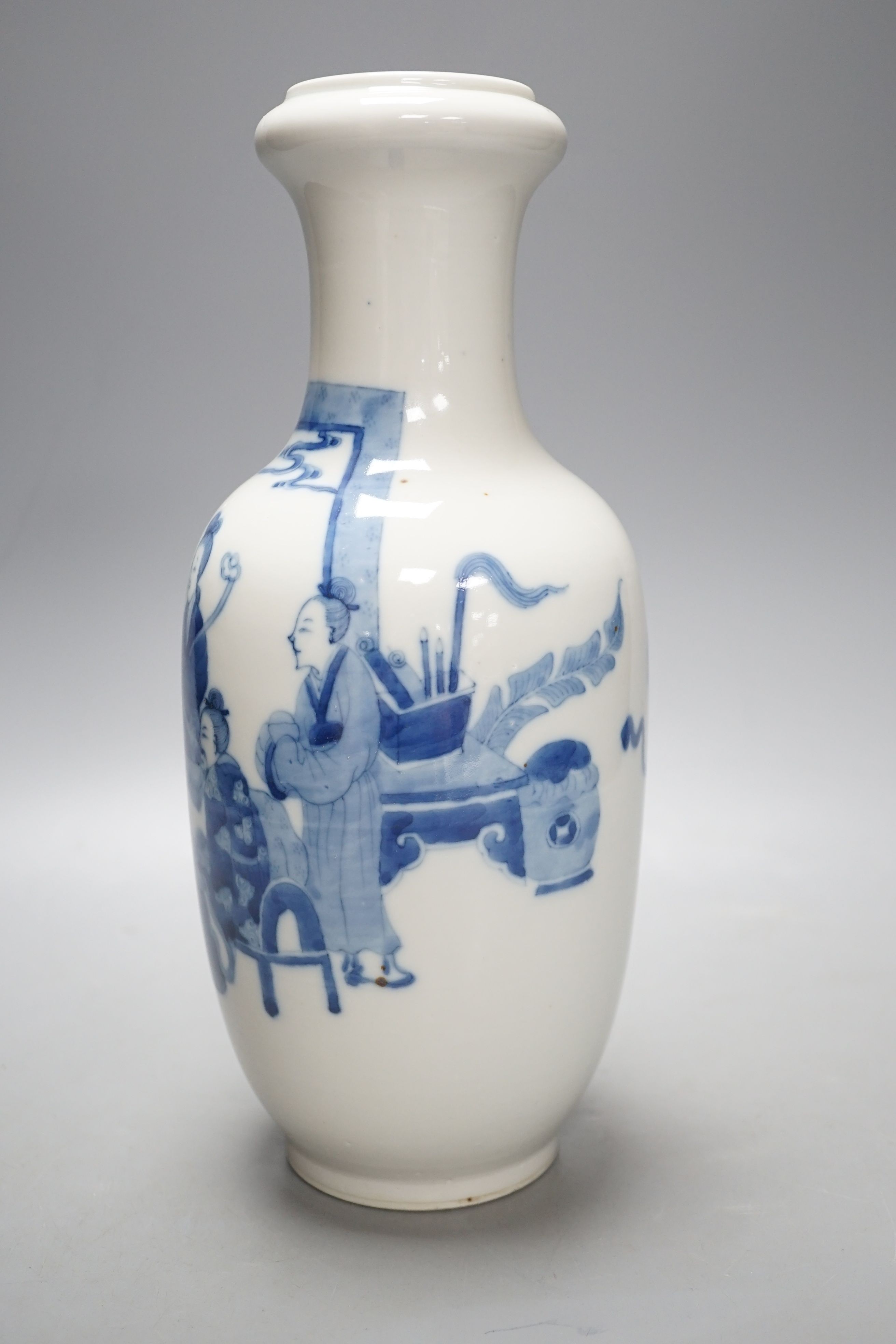 A Chinese blue and white ‘sages’ vase, 27 cms high.